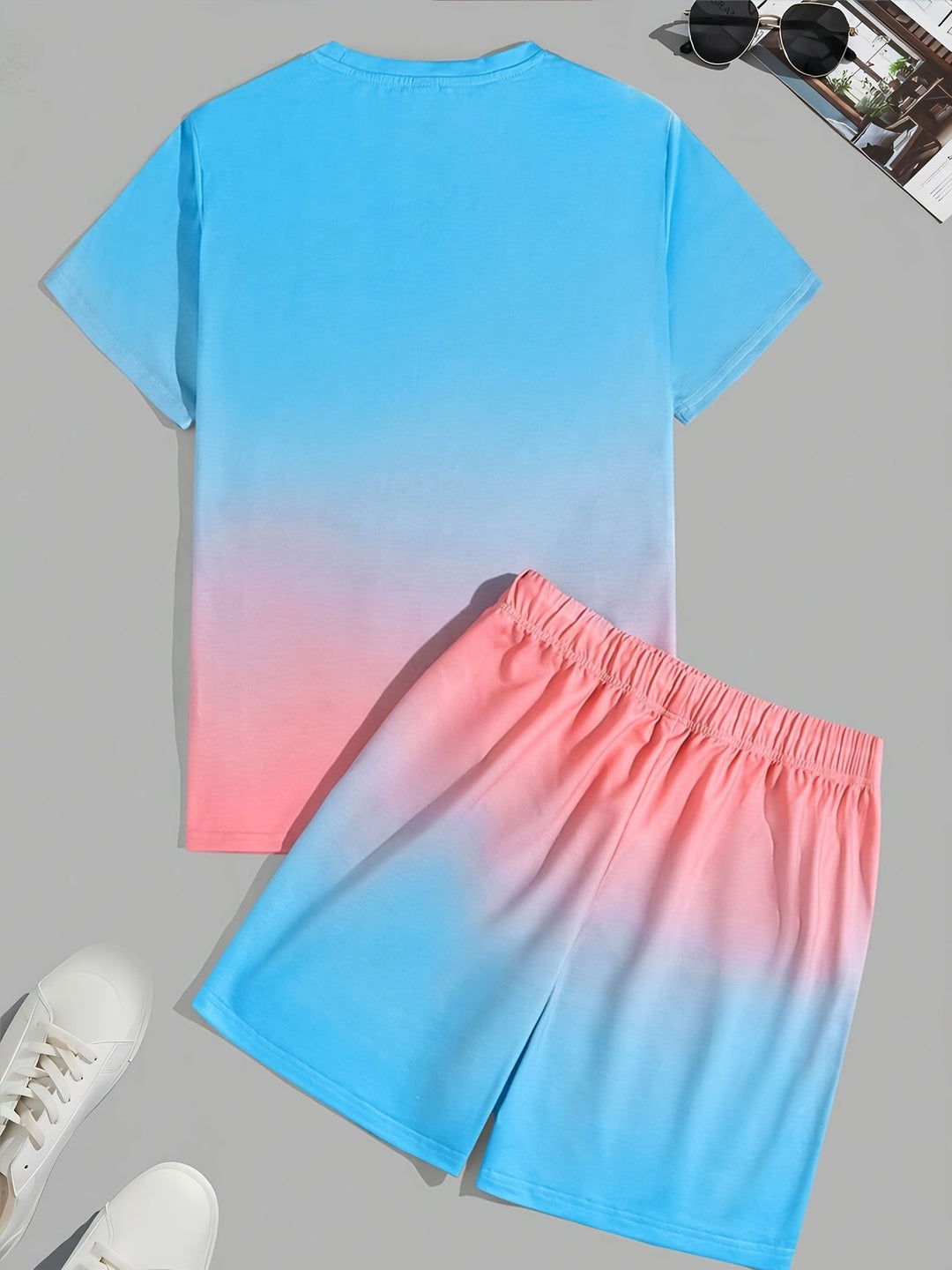 Stylish men's summer outfit featuring a comfortable t-shirt and matching shorts. Ideal for casual, beach, or loungewear.