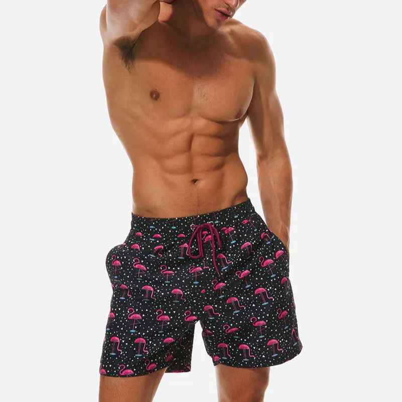 Comfortable men's tropical print swim trunks for stylish poolside lounging or beach vacations.