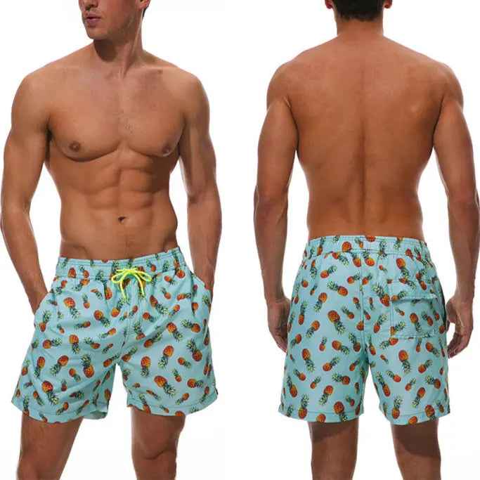 Men's tropical beach shorts, comfortable fit, ideal for summer vacation and poolside style.
