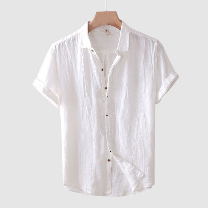 Comfortable men's short sleeve shirt with button front. Perfect for warm weather & everyday style.