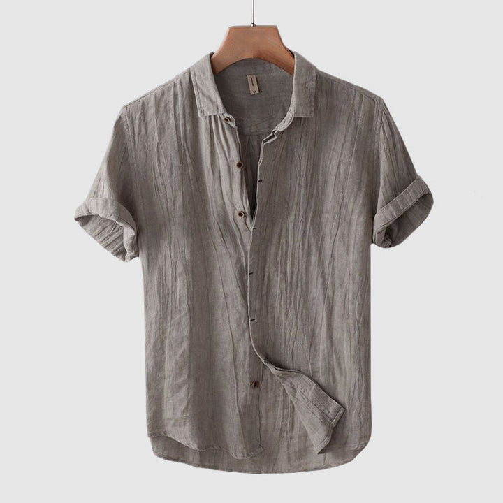 Stylish men's summer shirt, breathable & lightweight. Great for casual fashion & vacation outfits.