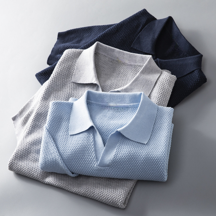 Green men's Molner performance polo. Comfortable, soft-touch short sleeve top, ideal for everyday casual style.