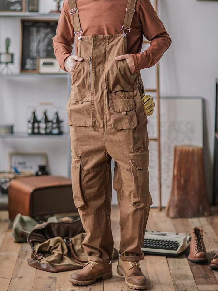 Comfortable men's relaxed fit utility overalls with cargo pockets, ideal for casual wear or active jobs.