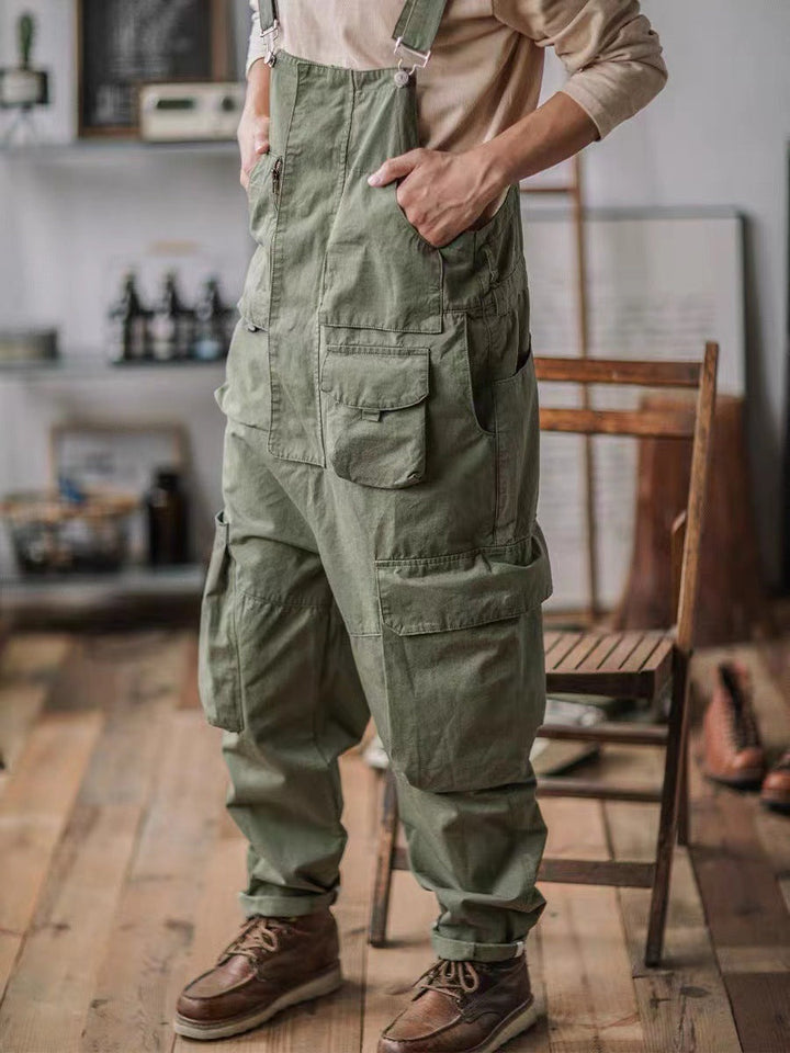 Men's workwear cargo bib overalls, featuring adjustable straps and a relaxed fit for all-day comfort & utility.