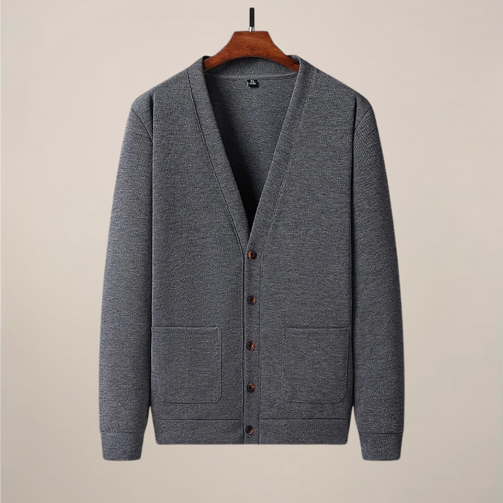 Men's V-neck button-up cardigan with pockets. Stylish knitwear, ideal for smart casual layering all season.