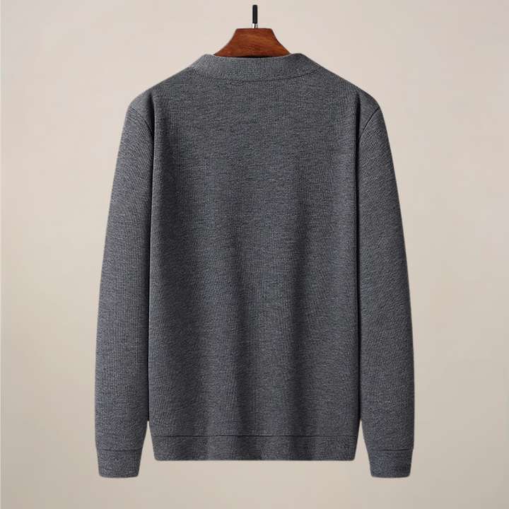 Versatile men's V-neck cardigan, button-front with practical pockets. Perfect for casual & smart casual fashion.