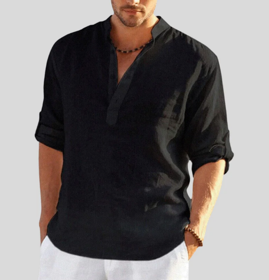 Man wearing a stylish V-neck short sleeve button-up summer shirt, showcasing its relaxed fit & casual look.