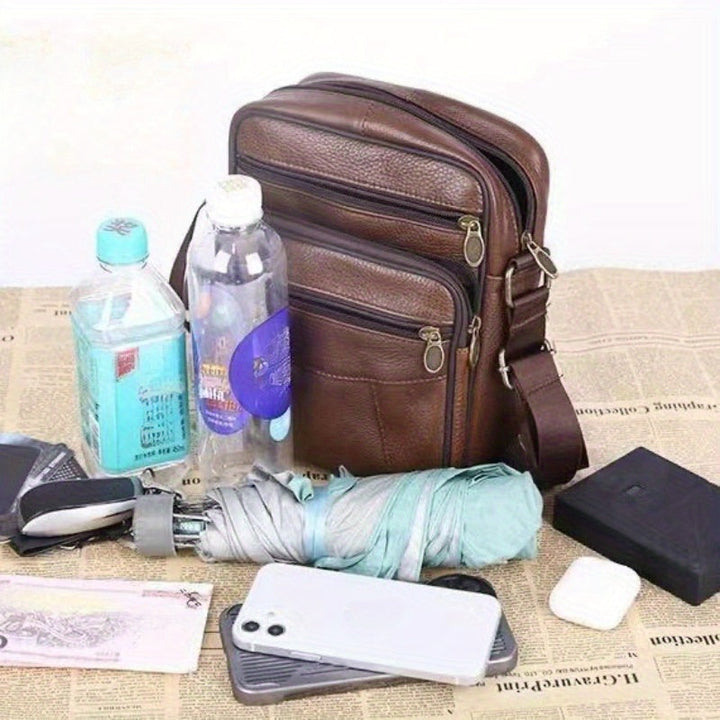 Adjustable men's shoulder bag, a sleek coffee messenger for versatile daily use, travel, or office.