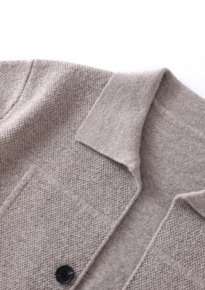 Casual men's long-sleeve button-up sweater featuring practical front pockets and a comfortable fit.