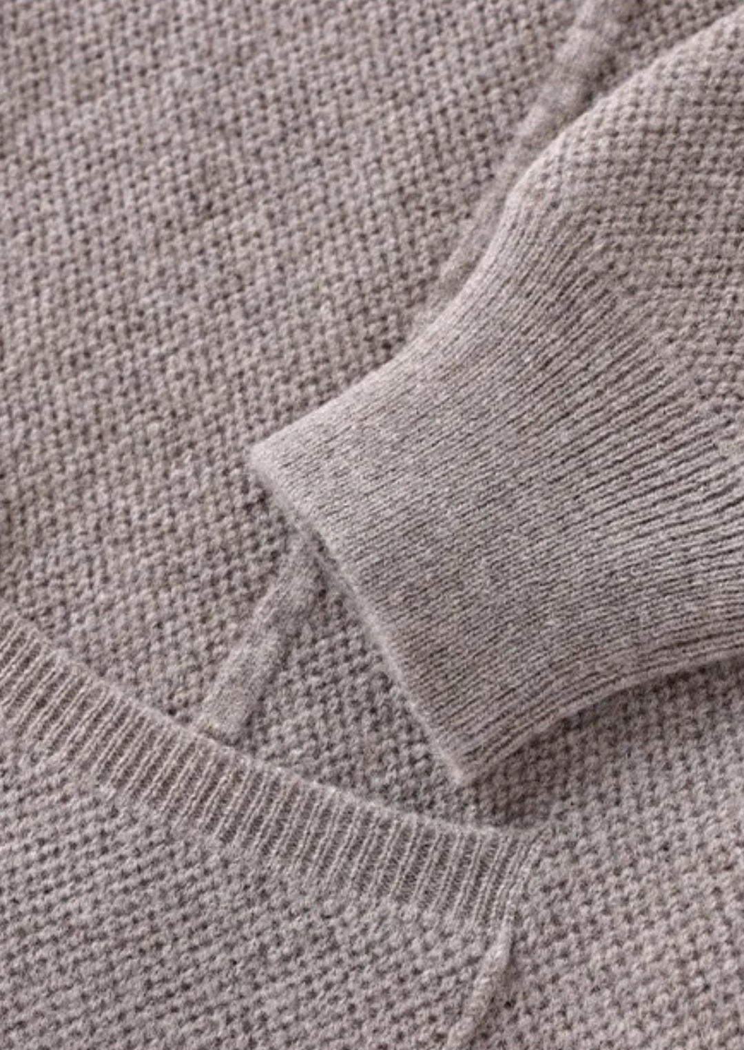 Soft men's button-up sweater, designed for comfortable layering and an effortless, versatile look.