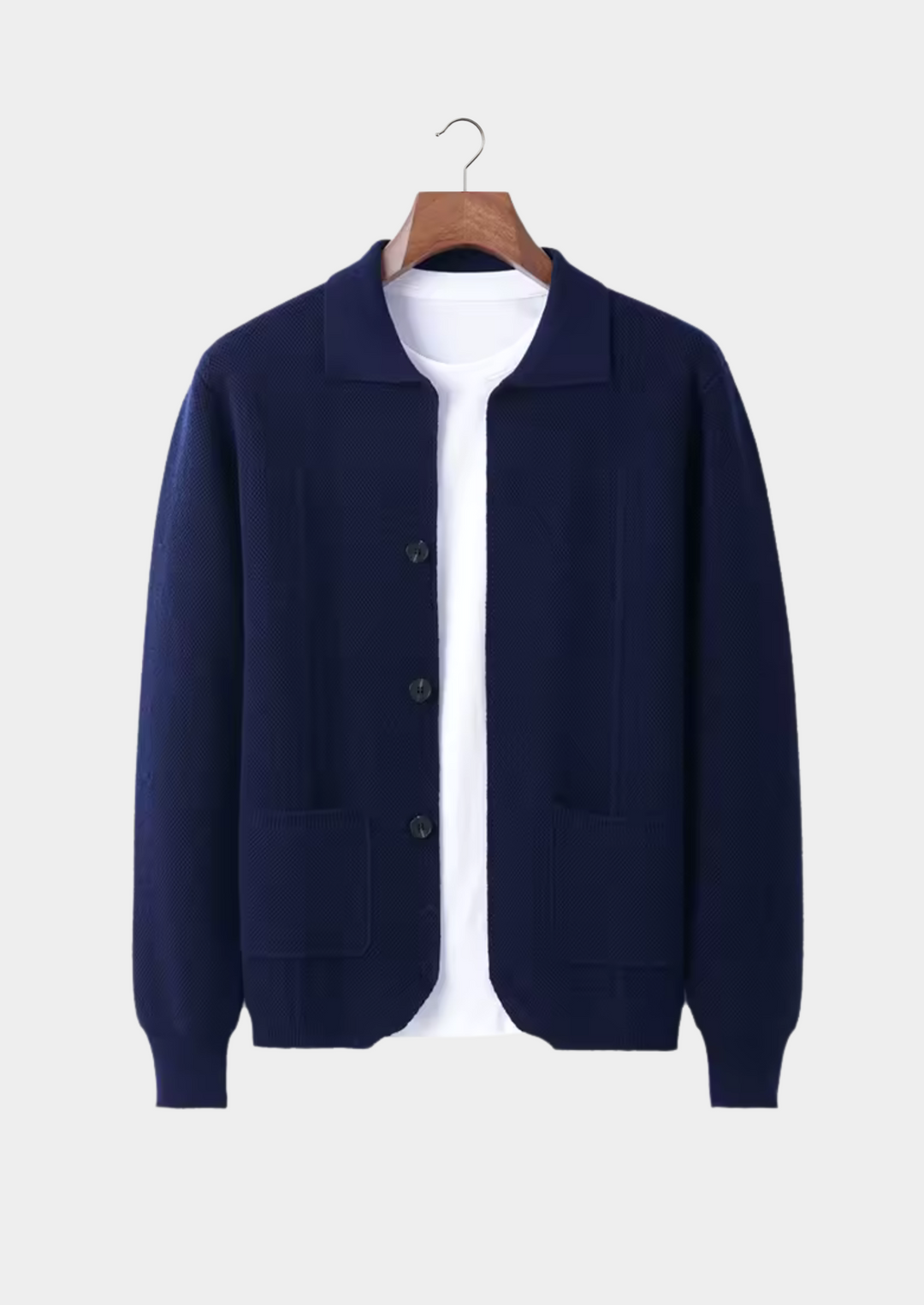 Button-up knit men's cardigan sweater with pockets, a durable and versatile choice for mens layering.