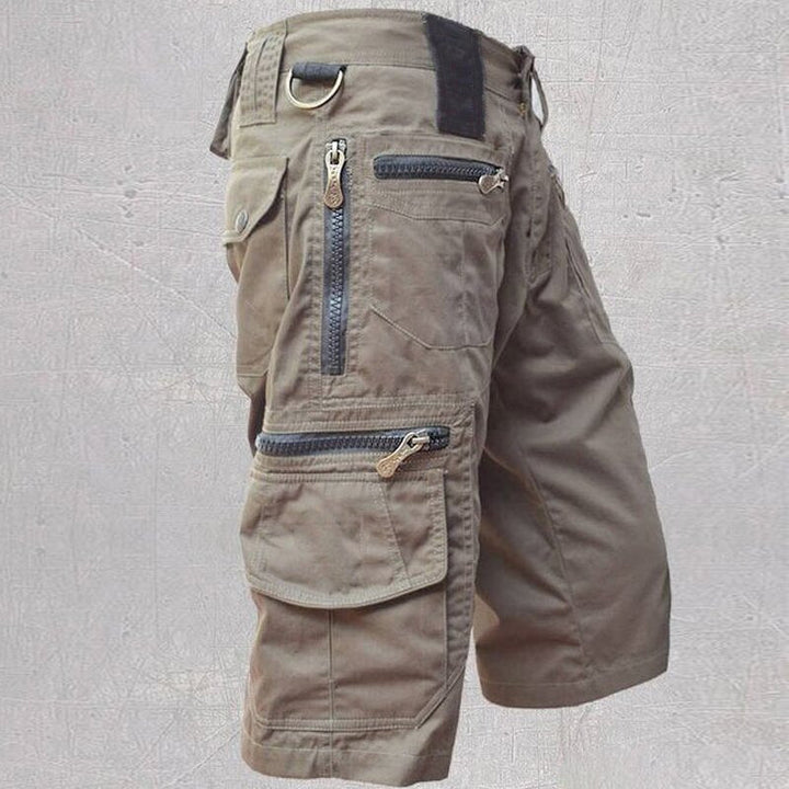 Durable men's activewear cargo shorts for hiking, travel, and casual summer outings. Features multi-pockets.