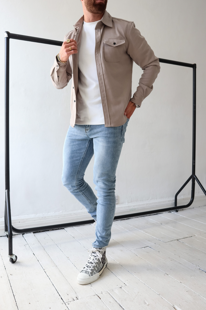 Stylish men's overshirt jacket, great for everyday casual wear. Long sleeve, chest pockets, button-up design.