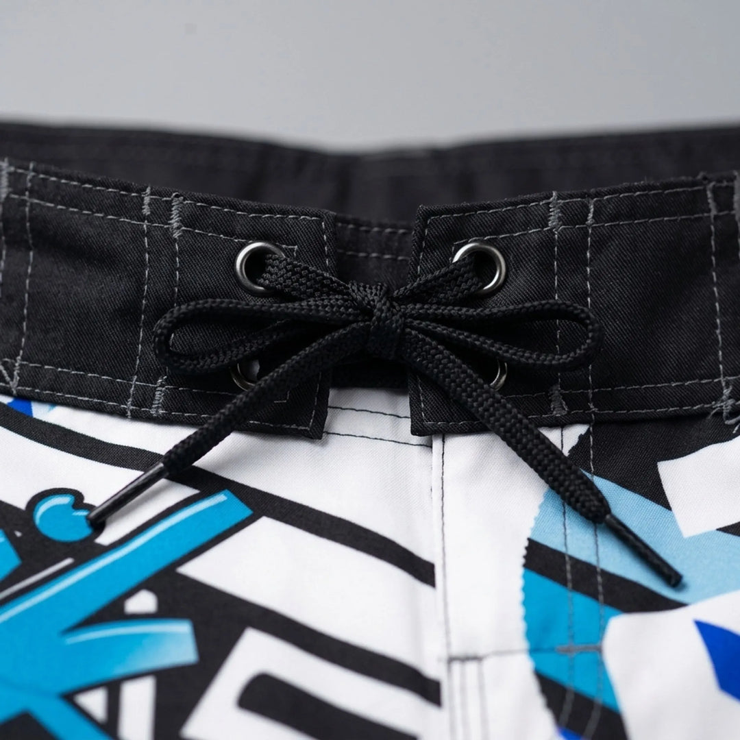 Quick-dry men's printed swim shorts with a vibrant pattern, ideal for active beachwear.