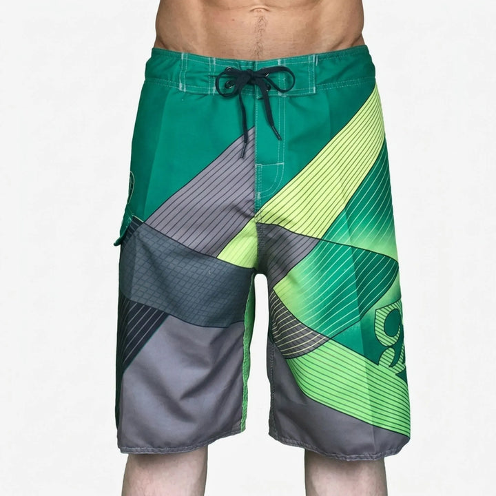 Performance men's quick-dry boardshorts with vibrant print, ideal for beach & pool activities.
