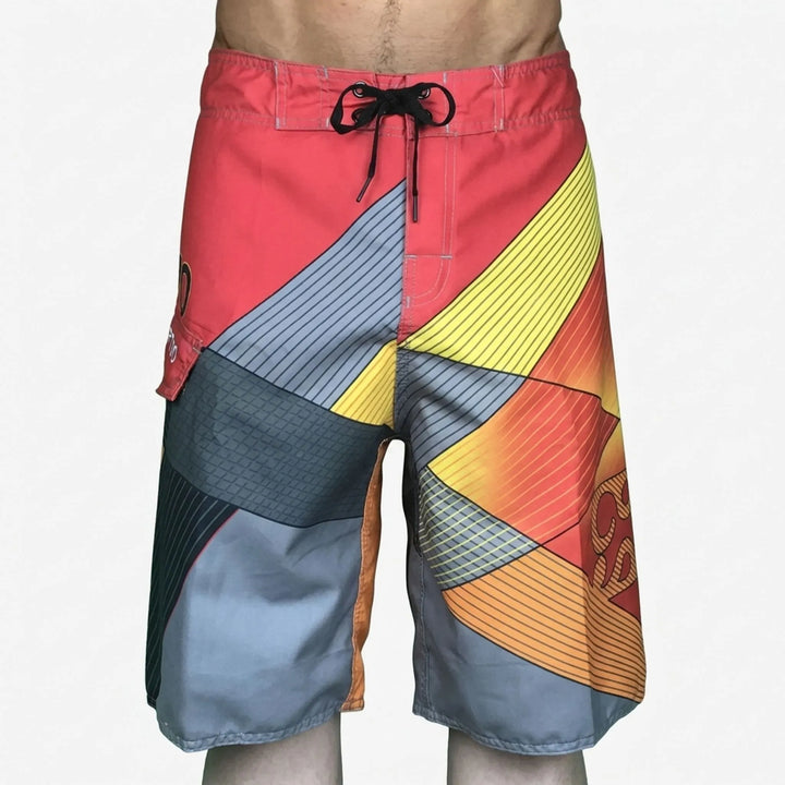 Bold men's quick-dry printed swim trunks, essential vibrant beach and pool shorts for summer.