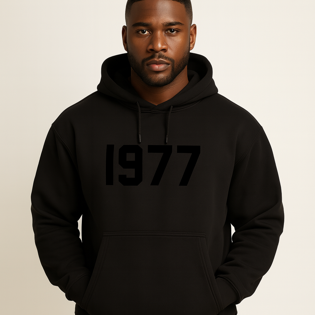 Close-up of men's vintage 1977 streetwear hoodie fabric. Raglan sleeves, cozy pullover texture.