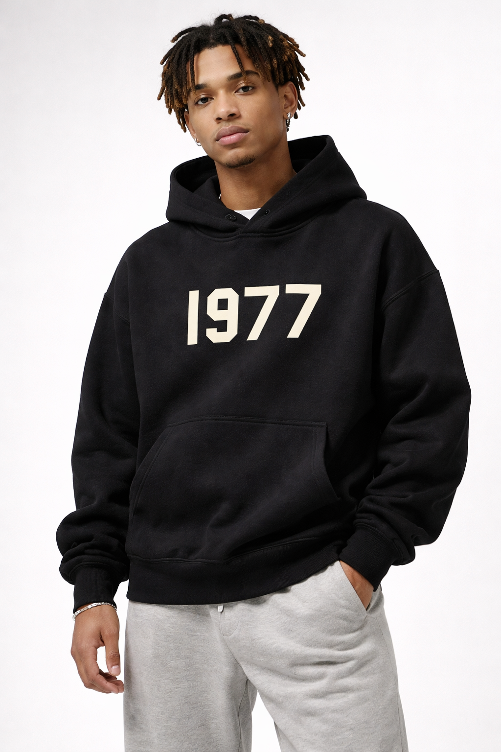 Back view of men's vintage 1977 raglan sleeve hoodie. Casual streetwear pullover design.
