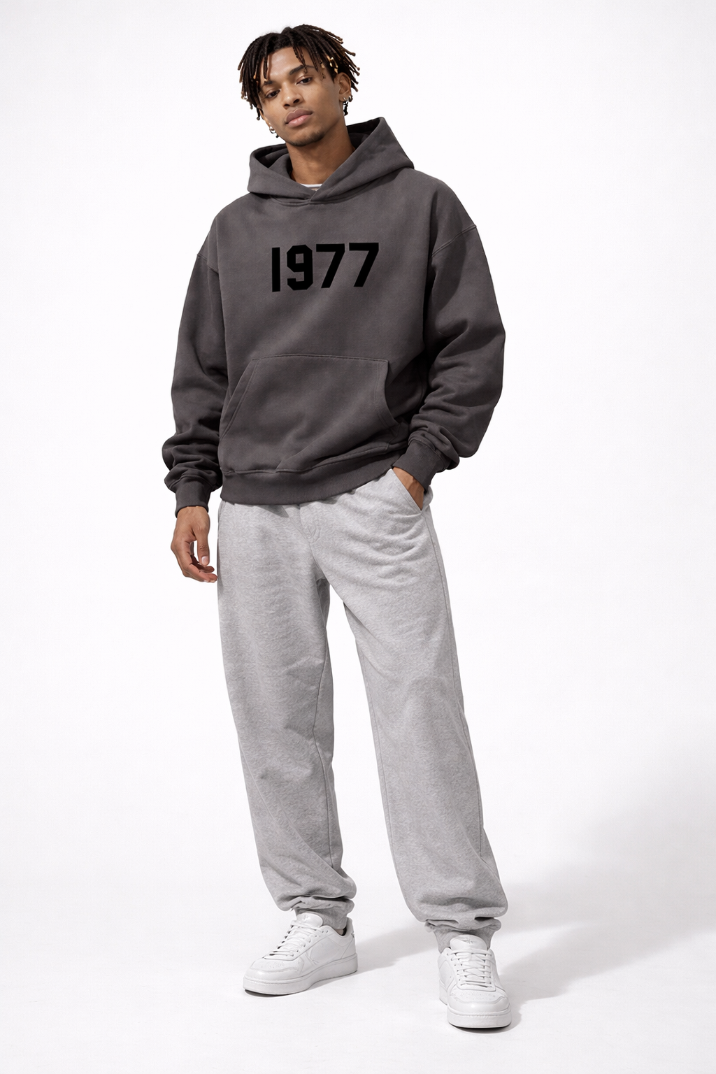Urban style men's vintage 1977 streetwear hoodie. Raglan sleeves, casual, retro hooded sweatshirt.