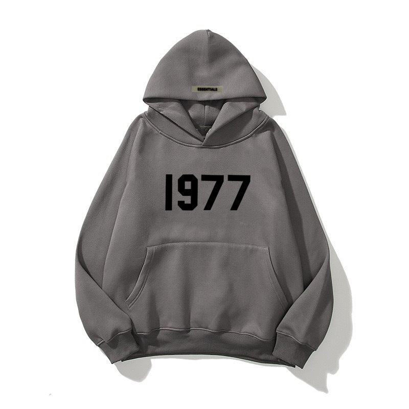 Men's raglan sleeve hoodie. Vintage 1977 streetwear design, comfortable hooded pullover.