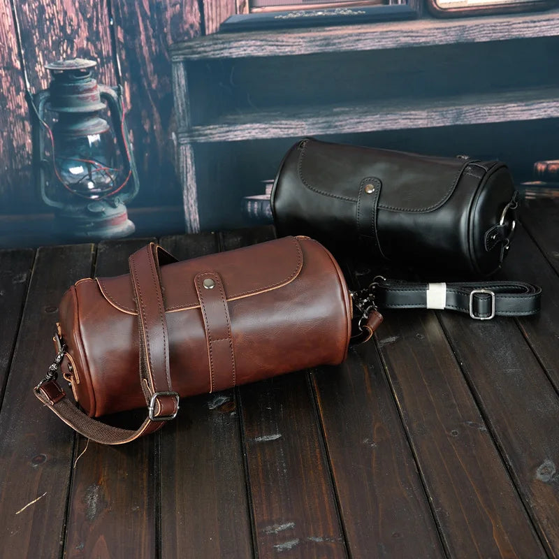 Durable men's vintage barrel shoulder bag, PU leather, perfect for daily carry & travel.