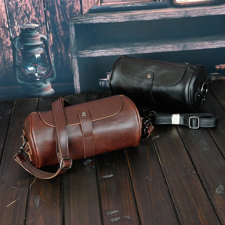 Durable men's vintage barrel shoulder bag, PU leather, perfect for daily carry & travel.