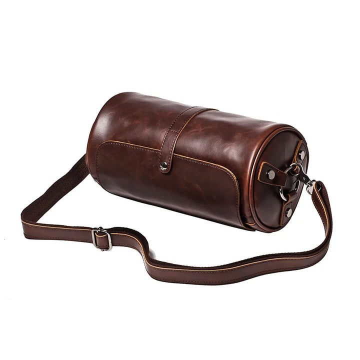 Modern vintage men's barrel shoulder bag, PU leather, comfortable crossbody for daily wear.