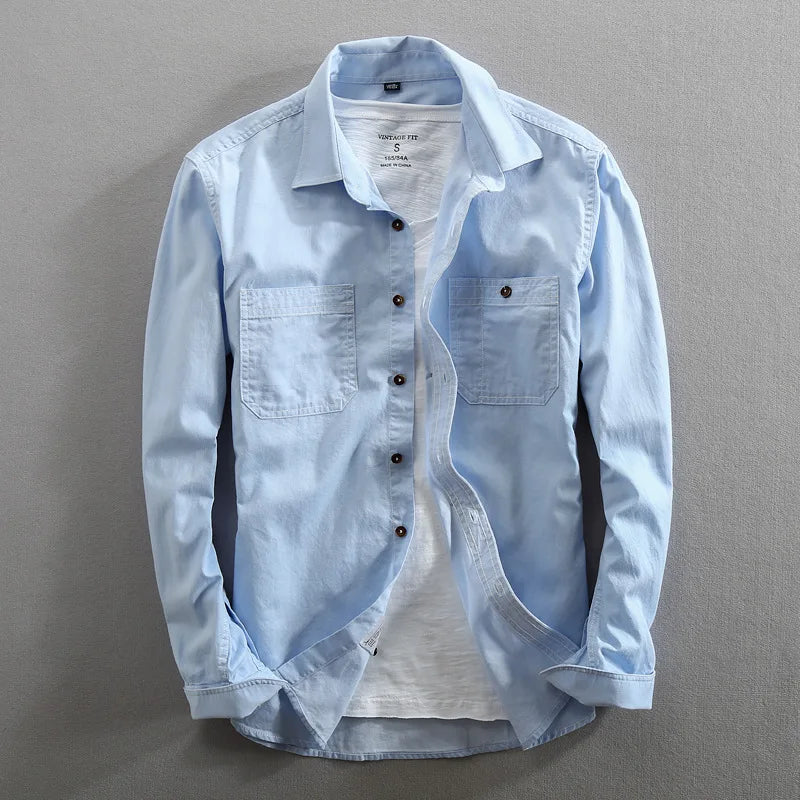 Durable men's vintage urban button-up shirt. Casual everyday wear with stylish dual chest pockets.