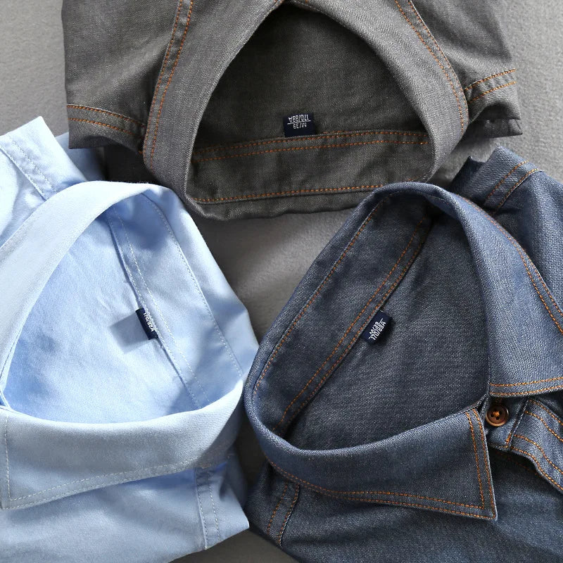 Stylish men's vintage urban button-up shirt, perfect for casual everyday fashion, with dual chest pockets.