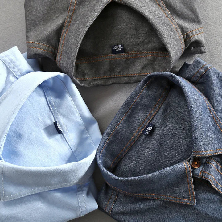 Stylish men's vintage urban button-up shirt, perfect for casual everyday fashion, with dual chest pockets.