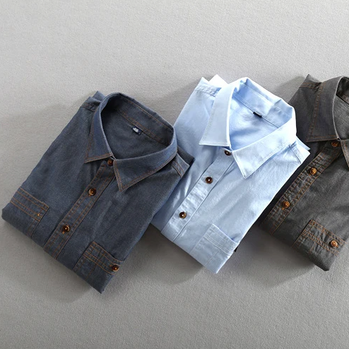 Men's vintage-style urban button-up shirt with dual chest pockets. Comfortable & timeless casual fashion.