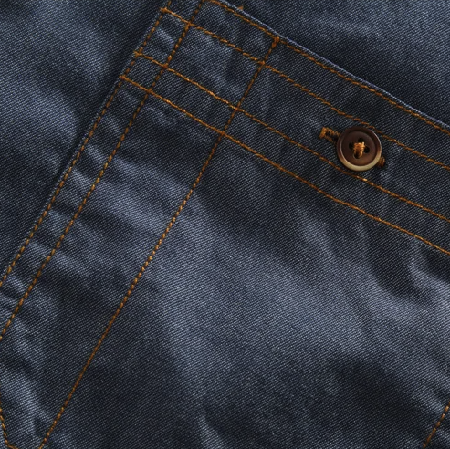 Versatile men's vintage urban casual shirt, button-up design, offering comfort and style with dual chest pockets.
