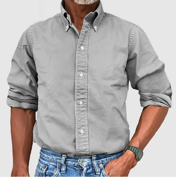 Modern classic men's vintage wash button-down shirt. Relaxed fit, long sleeve, perfect for comfort.