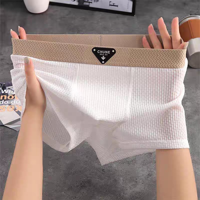 Stylish men's waffle knit boxers, versatile for loungewear or casual home comfort.