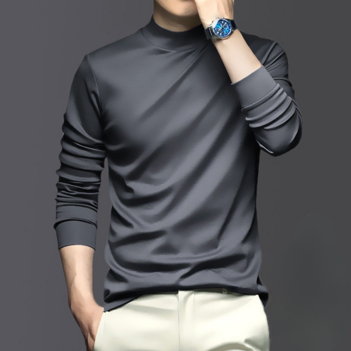 Stylish men's long sleeve shirt for warmth and comfort. Breathable, wrinkle-free polyester, perfect for casual winter.