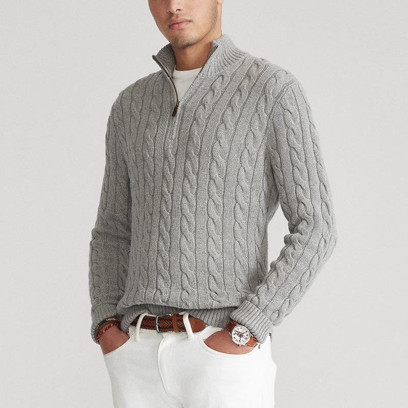 Men's warm half-zip pullover sweater in a soft textured knit, ideal for winter layering.