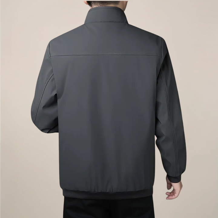 Stylish men's zip-up winter coat featuring a stand collar and insulated design for ultimate warmth.