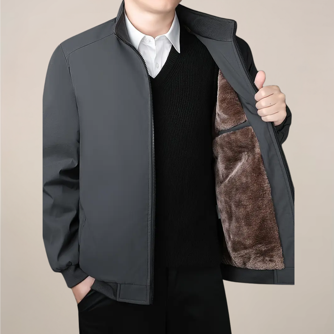 Durable men's insulated jacket, zip-up, stand collar. Ideal warm outerwear for harsh winter conditions.