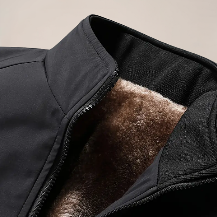 Men's stand collar zip-up jacket. This warm, insulated winter coat is essential outerwear for cold climates.