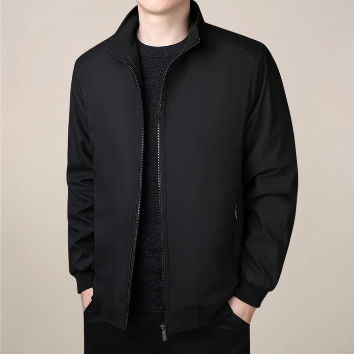 Men's warm insulated jacket, great for outdoor activities in winter. Features a stand collar and zip-up design.