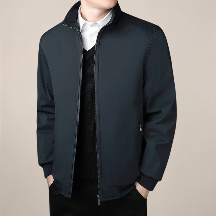 Modern men's zip-up insulated winter coat with a sleek stand collar, versatile warm outerwear for any cold day.