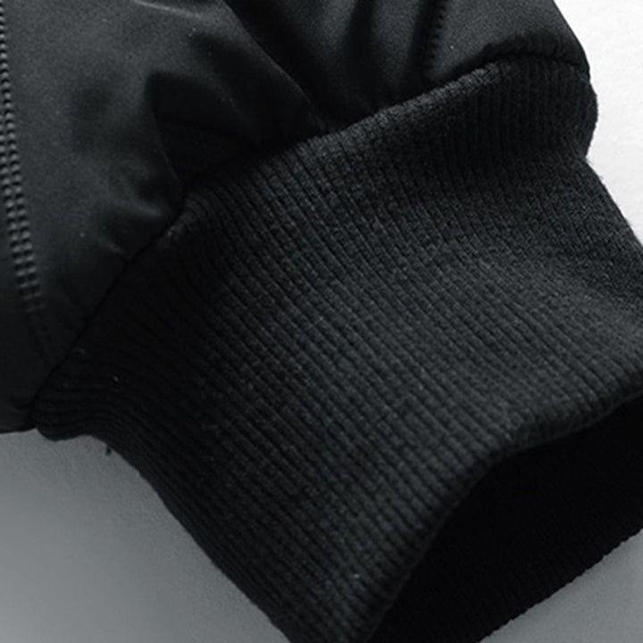 Side view of a men's warm quilted bomber jacket. Casual men's fashion, perfect for cold autumn & winter.