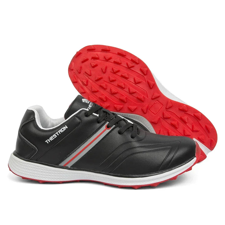Men's waterproof athletic golf shoes with fixed spikes, perfect for course wear & performance.