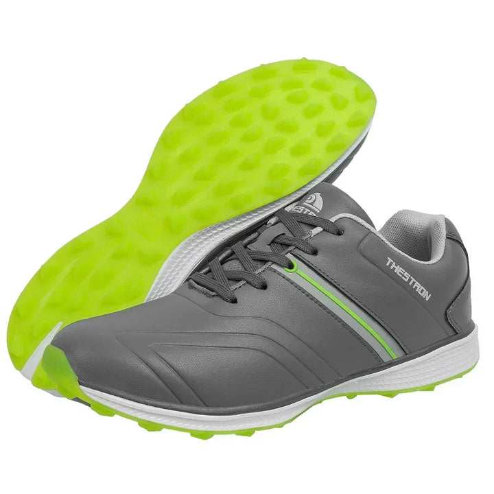 Durable men's golf shoes, waterproof with fixed spike traction for enhanced grip & comfort.