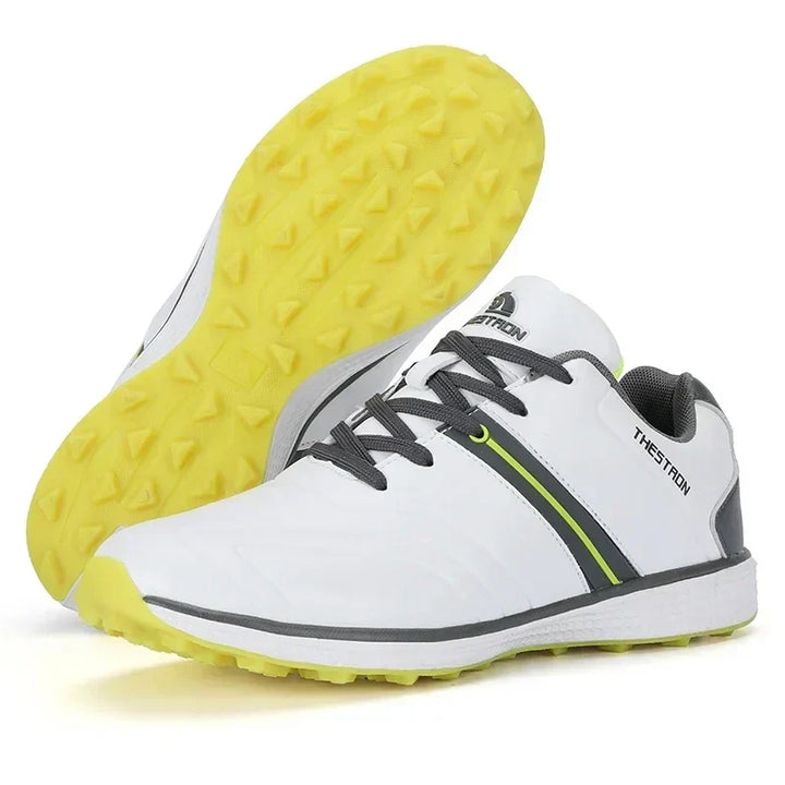 Fixed spike men's waterproof golf shoes for reliable traction & comfort during play.