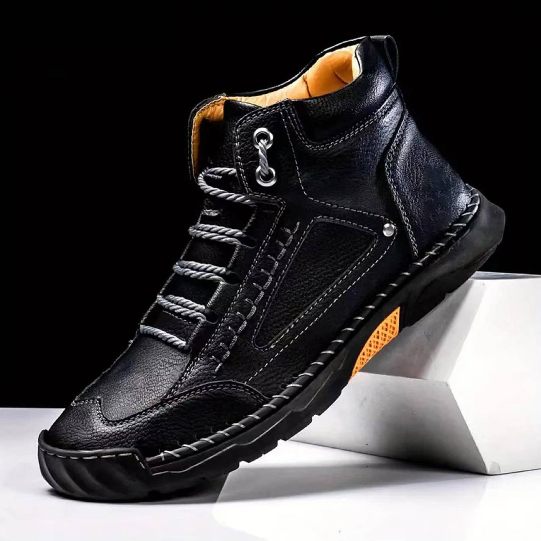 Side view of men's brown waterproof hiking boots, highlighting arch support and durable design.