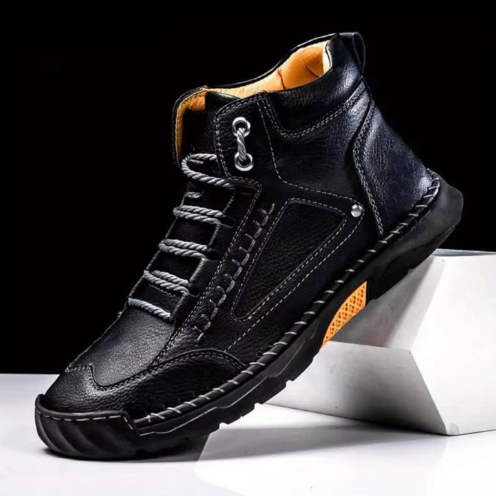 Side view of men's brown waterproof hiking boots, highlighting arch support and durable design.