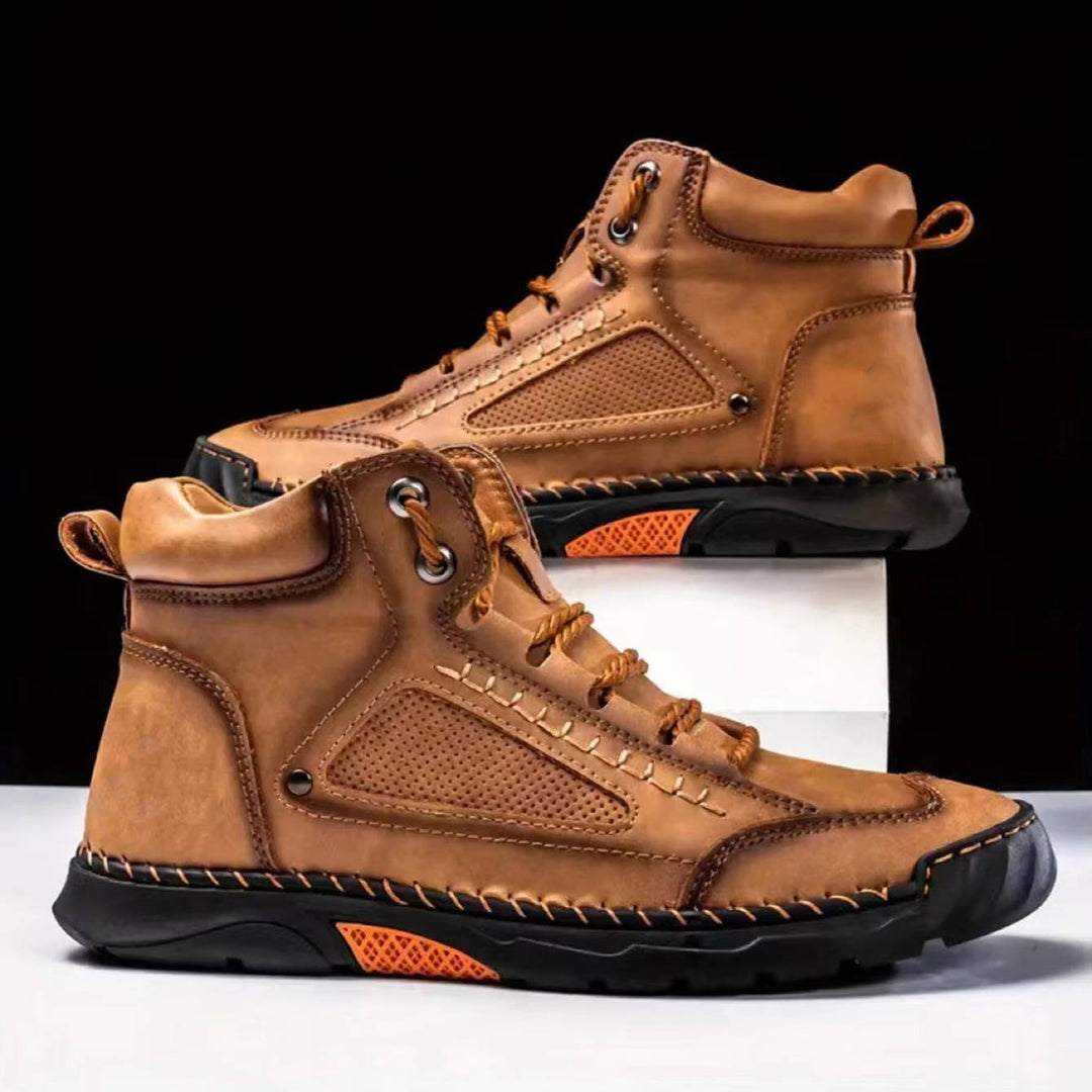 Close-up of men's waterproof hiking boots showing rugged sole for excellent trail grip.