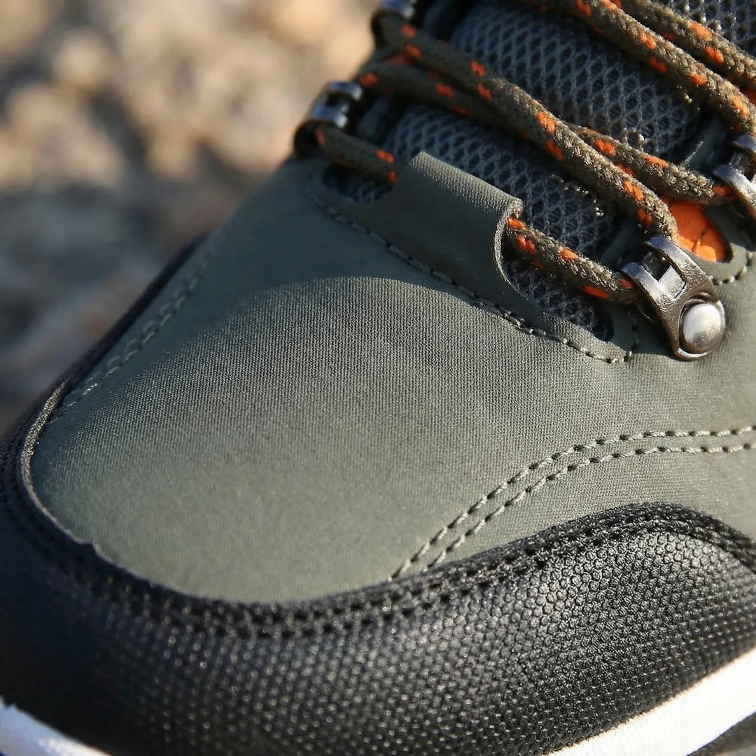 Durable men's low-cut waterproof hiking shoes for adventure, camping, and outdoor exploration.