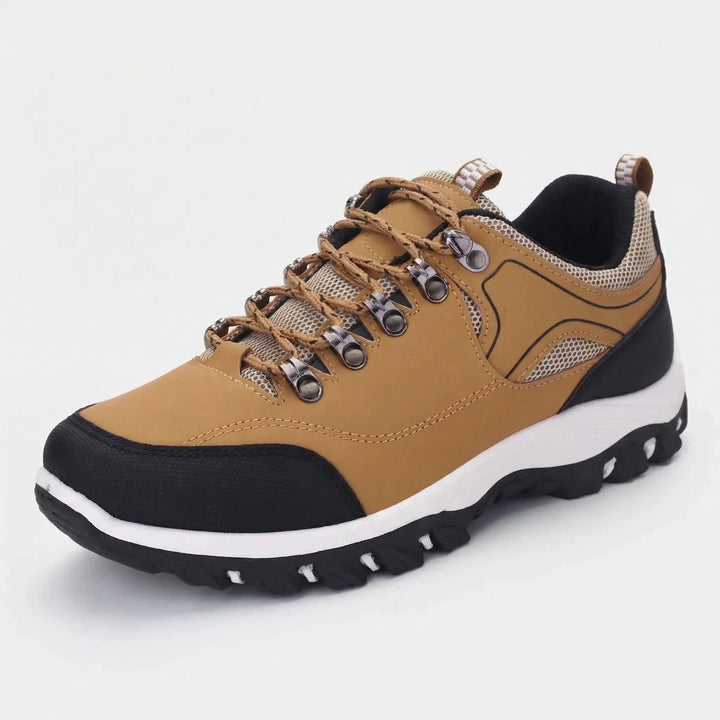 Men's low-cut waterproof hiking shoes offering superior grip for rugged outdoor trails and comfort.